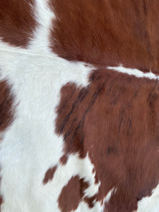 95. Brown white Cowhide