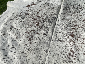 a121. Brown white speckled Cowhide