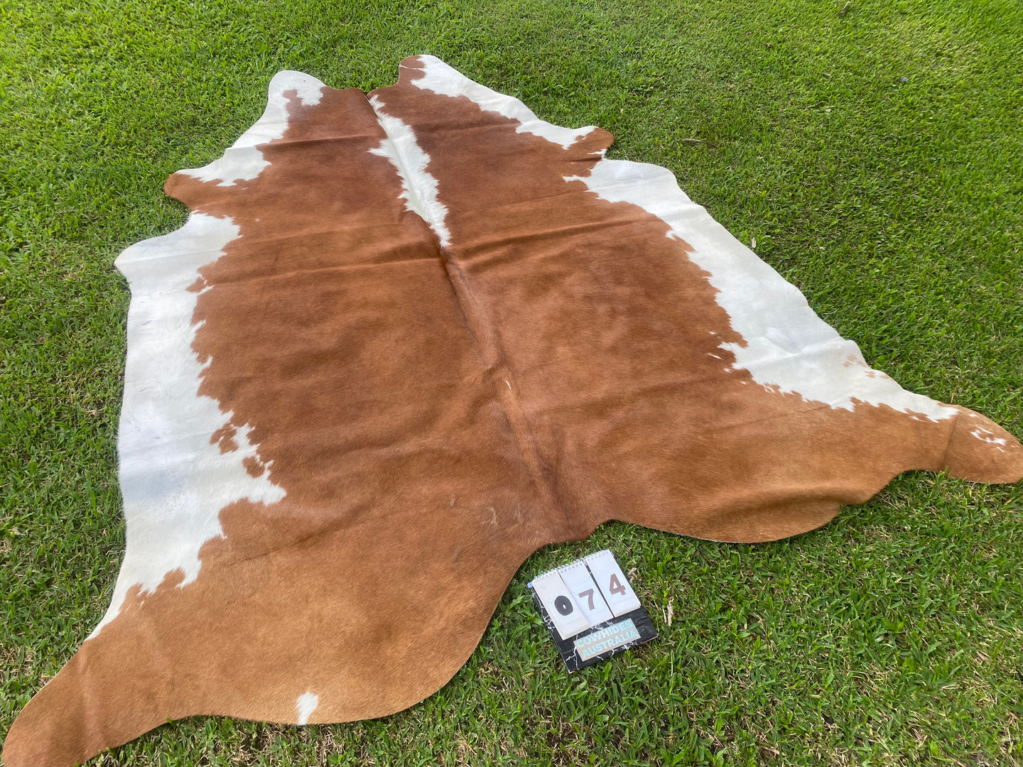 74. Brown white special   Cowhide