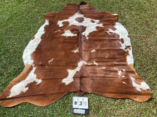 35. Brown and white speckled Cowhide