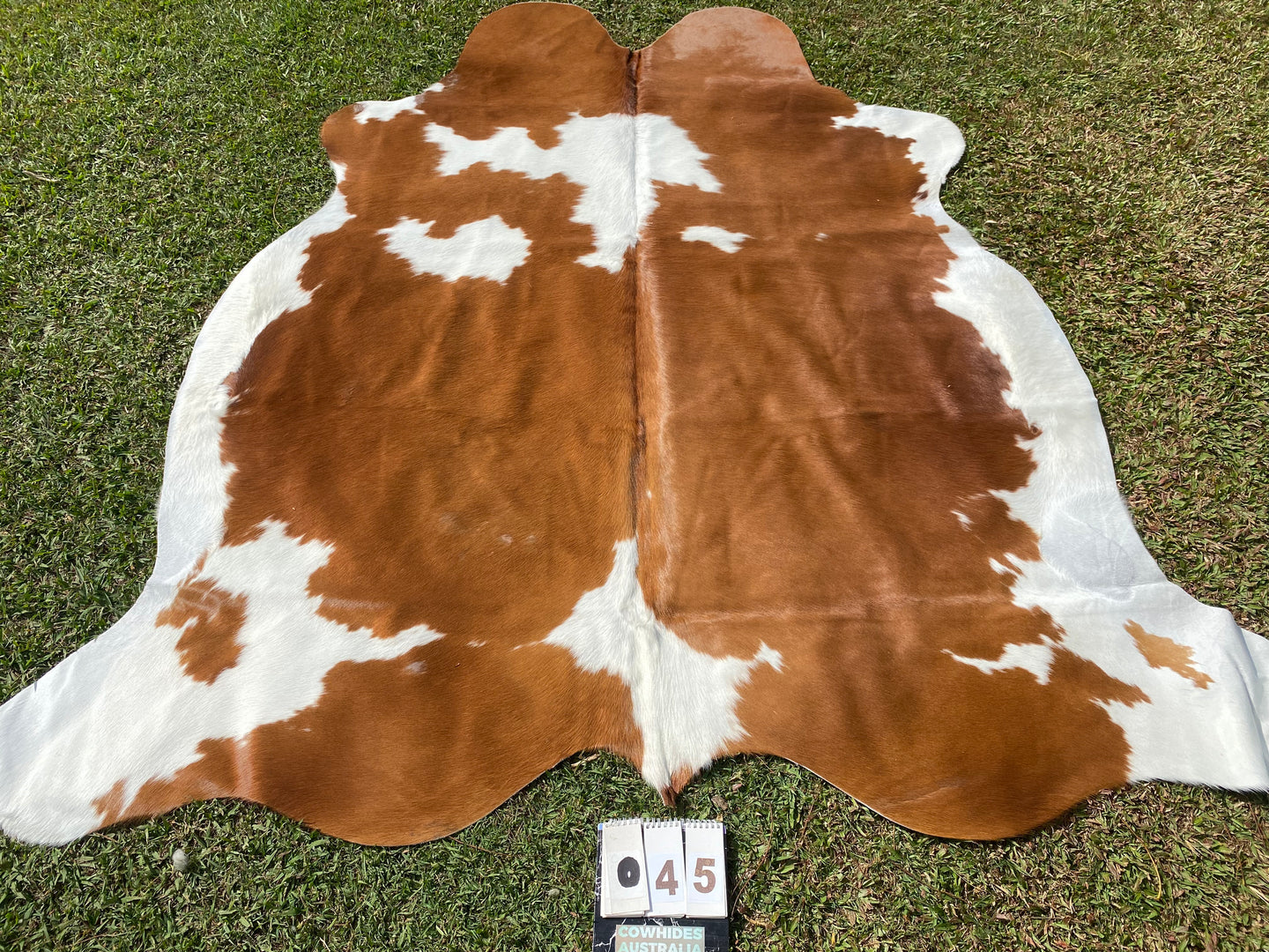 45.  Tan white  Cowhide