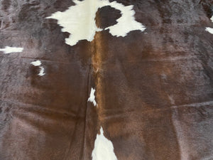 a200. Black white reddish  Cowhide