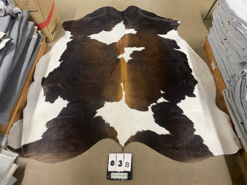 38. Black white reddish Cowhide