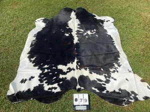 79. Black white reddish Cowhide