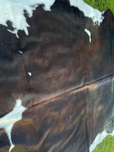 a142. Black white reddish Cowhide