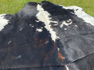 79. Black white reddish Cowhide