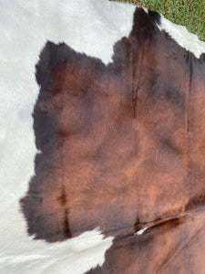 a144. Black White Reddish Cowhide