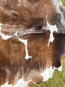 a192. Black white reddish Cowhide