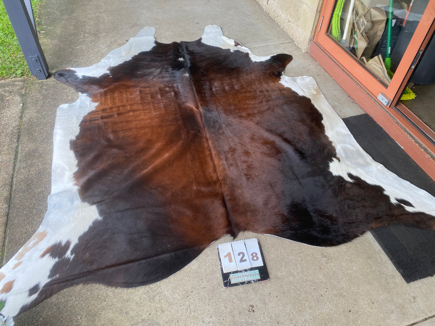 a128. Black white reddish Cowhide