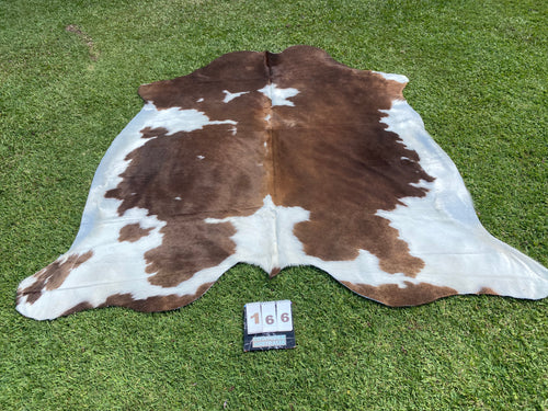 a166. Brown white Cowhide