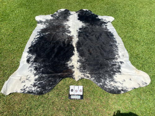 96: Black white with reddish flecks Cowhide