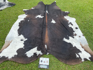 65. Black White Reddish Cowhide