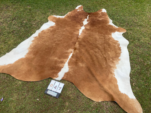 47. Tan white Cowhide