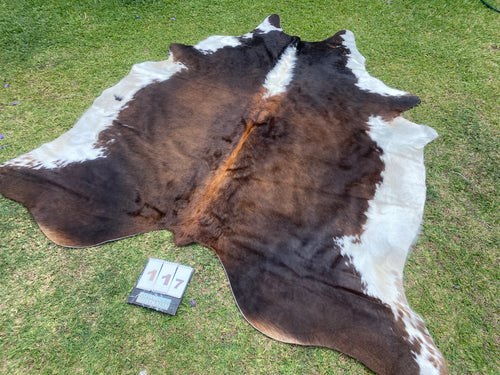 a117. Black white reddish Cowhide