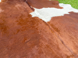 a119. Brown white  Cowhide