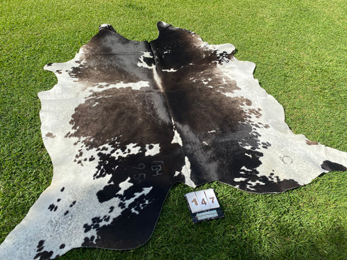 a147. Black white reddish Cowhide