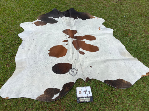 17. Black white reddish Cowhide