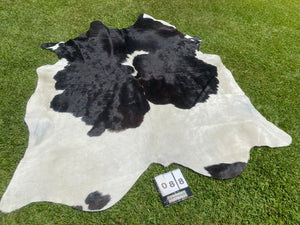 88. Black white reddish  Cowhide